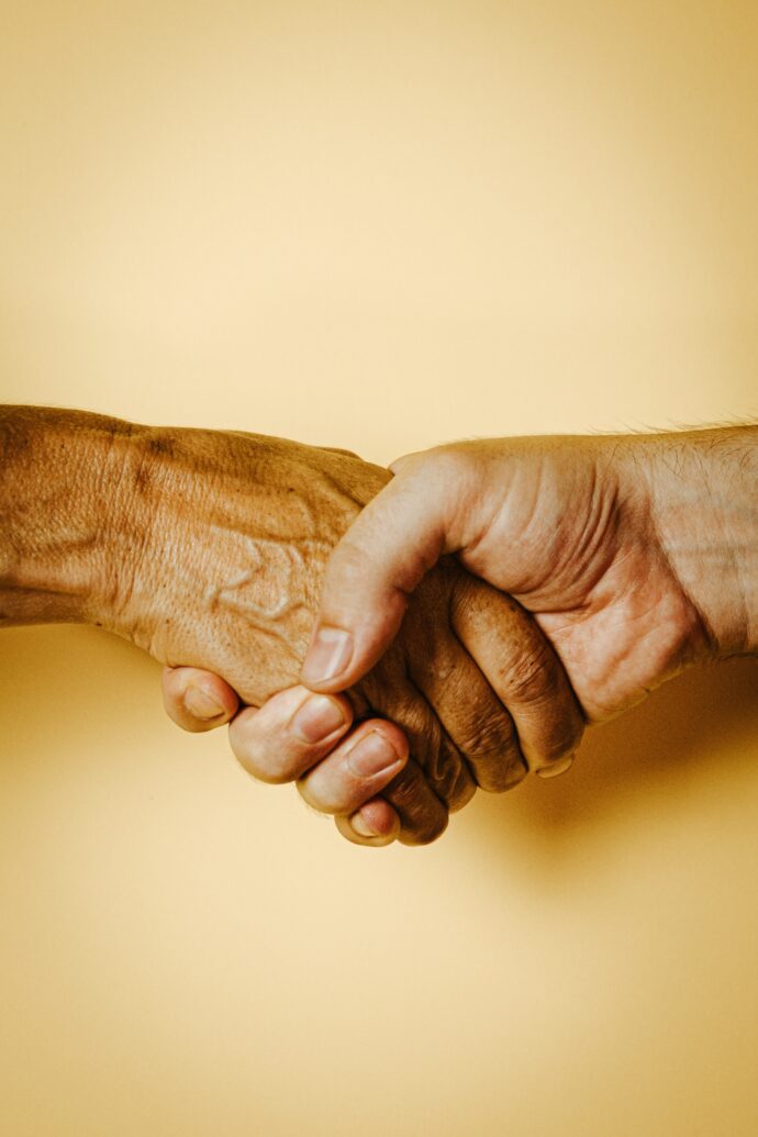 A handshake, demonstrating how gestures promote cultural sensitivity